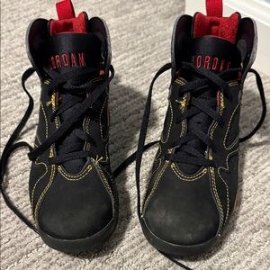 Jordan Kids Black Sneakers with Red and Yellow Accents